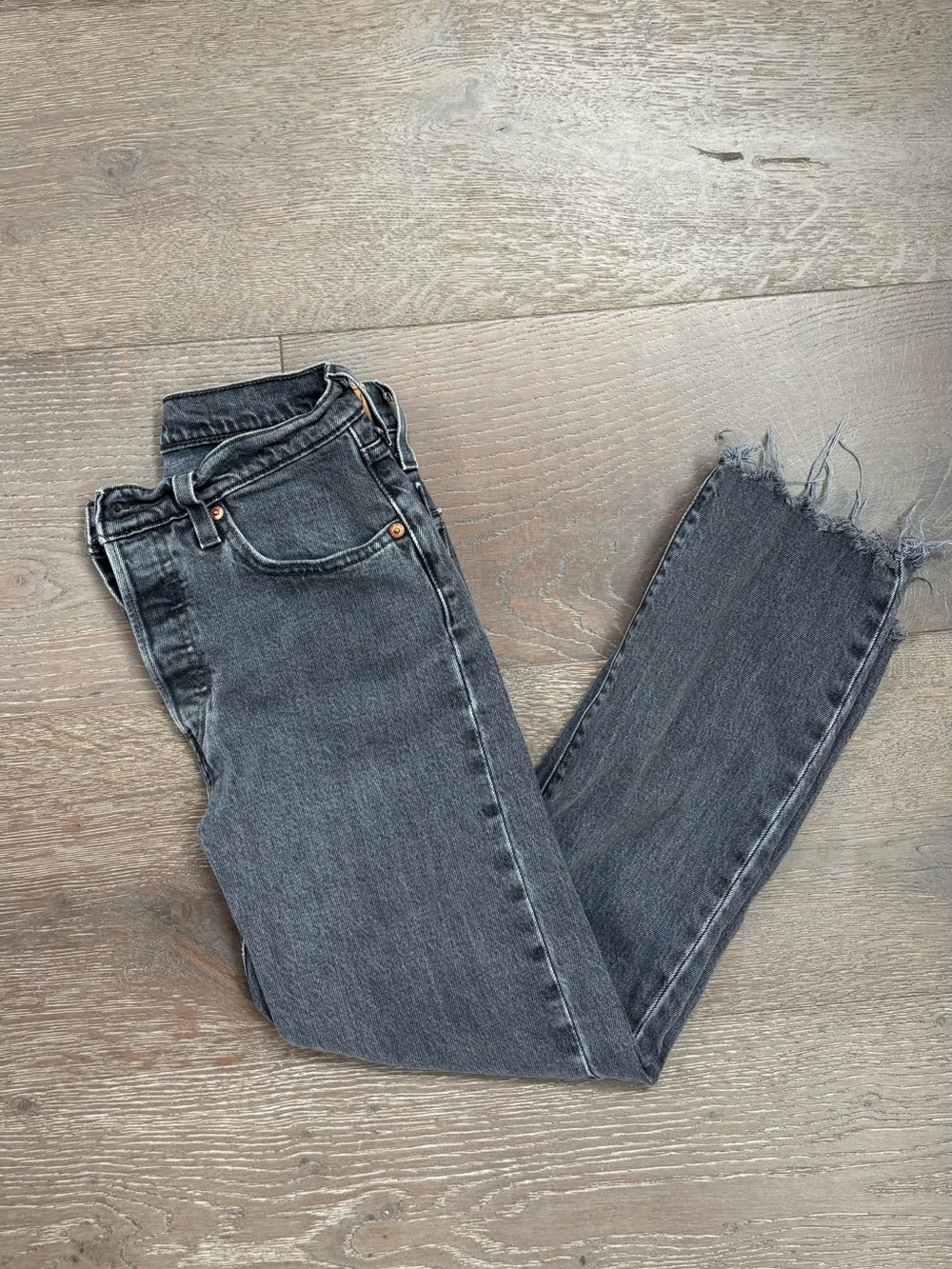 Levi’s High-Rise Raw Hem Black Jeans